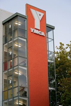 YMCA logo on building facade in urban setting &ndash; editorial photo