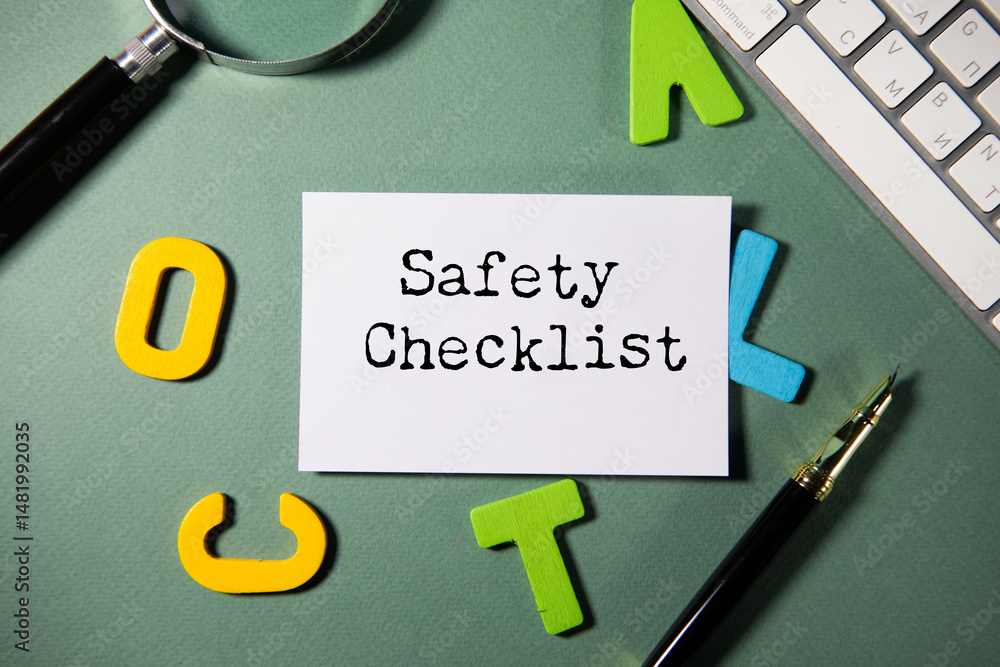 Poster safety checklist text on the notepad