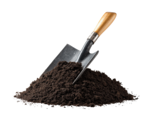 Garden tools for planting with soil and trowel ready for use