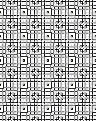 Fototapeta premium Geometric design with a series of black squares and lines creating a symmetrical pattern on a white surface, ideal for various uses