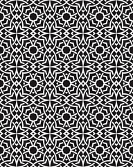 A complex arrangement of black and white geometric shapes forms an elegant pattern, displaying spirals and floral motifs throughout the design