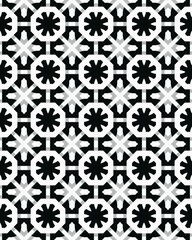 Complex geometric patterns showcase black and white shapes arranged in a symmetrical layout, creating a dynamic visual effect