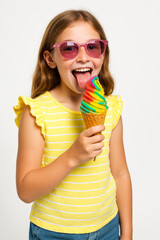 Smiling girl with rainbow ice cream – cheerful summer treat portrait on white background
