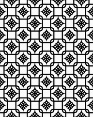 Intricate black and white geometric patterns create a visually striking effect with repeated shapes and symmetry, showcasing detailed artwork