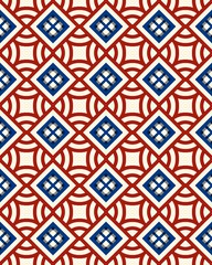 Colorful geometric shapes create a visually striking pattern with red, blue, and white diamonds on a light cream background