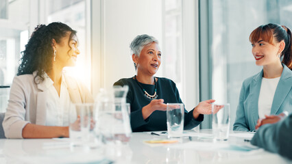 Fototapeta premium Business, people and happy with discussion in office for funding negotiation, investment opportunity or good news. Financial investor, group and collaboration with positive feedback or revenue update