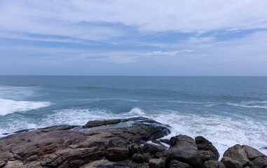 Beach landscape, Beautiful arial view of beach with sea waves and coconut trees. Nature scenery. 