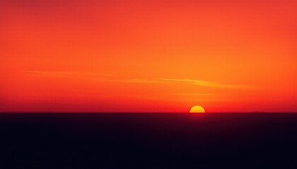 Fototapeta premium Vibrant Sunset Landscape Photo Fiery Orange Sky and Setting Sun Over Horizon