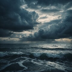 Obraz premium Dark stormy clouds loom over the vast ocean, hinting at a powerful storm at sea