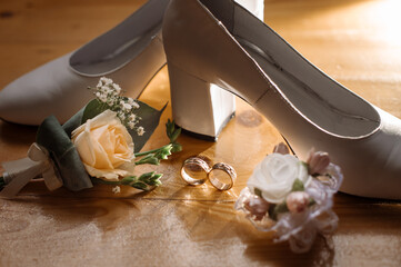 Wedding accessories. Shoes, wedding rings, bouquets. Bride's morning, preparation