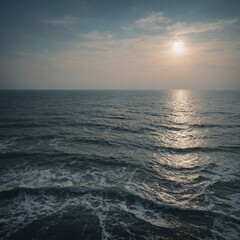 Fototapeta premium A beautiful sunset paints the sky with vibrant colors over the tranquil sea, where gentle waves meet the horizon