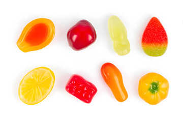 Top view collection of different fruit gummy colorful candy isolated on white background