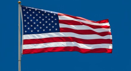 Photo of American Flag Waving in Blue Sky
