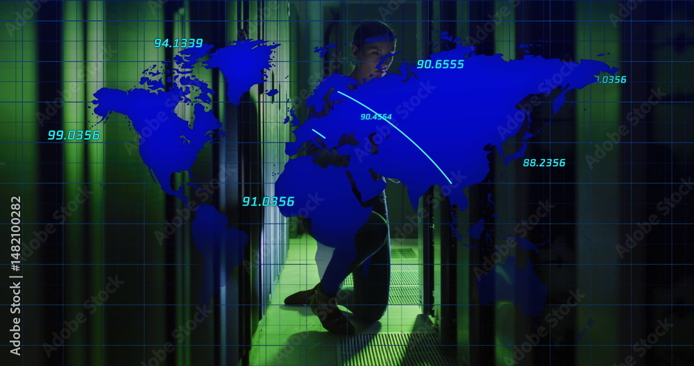 Poster crouching hoodie-clad technician accessing server racks in data center with leds, world map overlay