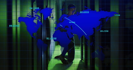 Crouching hoodie-clad technician accessing server racks in data center with LEDs, world map overlay