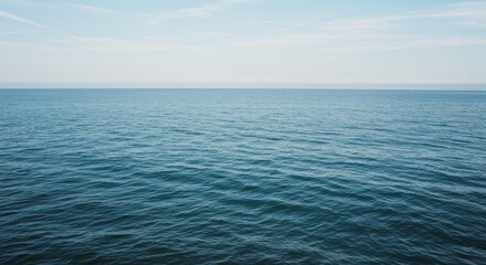 Obraz premium Photo of Calm Blue Ocean Under Cloudy Sky