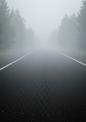 Photo of Empty Foggy Road in the Early Morning