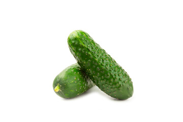 Cucumber isolated on white background. Slice of cucumber on white background. Fresh organic green cucumbers. Vegan. Ingredient for salad. Farm vegetables.