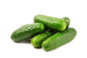 Cucumber isolated on white background. Slice of cucumber on white background. Fresh organic green cucumbers. Vegan. Ingredient for salad. Farm vegetables.