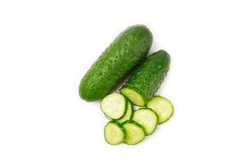 Cucumber isolated on white background. Slice of cucumber on white background. Fresh organic green cucumbers. Vegan. Ingredient for salad. Farm vegetables.