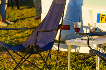 Camp chair at motorhome on nature