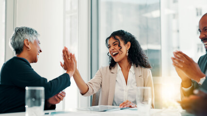 Fototapeta na wymiar Business people, winner and high five in promotion, announcement or negotiation success at office. Employees, team celebration or group applause for partnership, prize or workplace contract goal