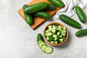 Cucumber on wooden background. Slice of cucumber on background. Fresh organic green cucumbers...