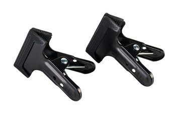 Black plastic spring clamp isolated on transparent background.