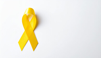 Yellow awareness ribbon on white backdrop. Symbol of support For troops military, suicide prevention