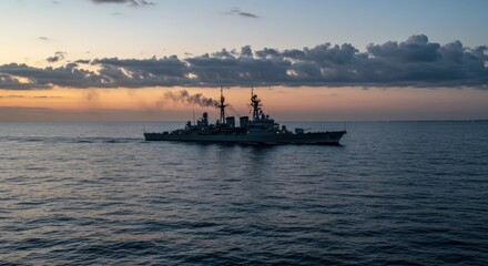Obraz premium Navy Ship at Sea During Sunset