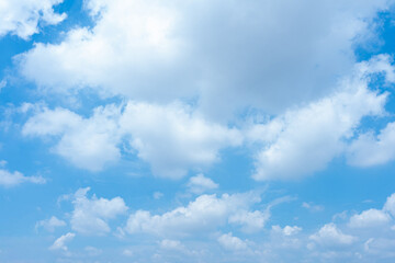 Serene Blue Sky with Fluffy White Cumulus Clouds Peaceful Nature Background