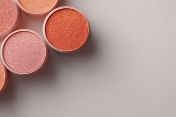 Fototapeta premium collection of modern makeup products arranged on sleek white surface