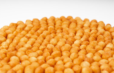 Small pastry balls, fried crispy wheat soup pearls, salad egg puffs or choux pastry