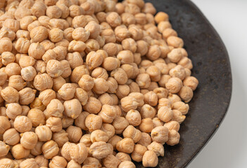 Chickpea, chick pea pile, dry Cicer arietinum fruits, raw Bengal gram legume, garbanzo beans