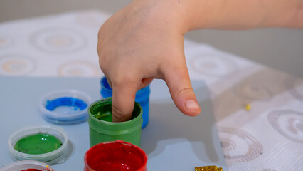 Colorful Finger Painting Activity for Kids with Bright Yellow Paint and Creative Learning Environment on White Background, Early Childhood Education Concept
