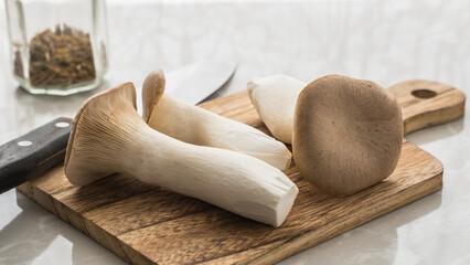 King oyster mushrooms on the cutting board