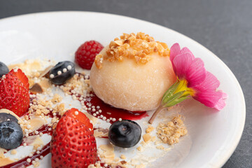 Fruit mochi rice cake, white daifuku, Japanese traditional dessert, round wagashi, asian candy