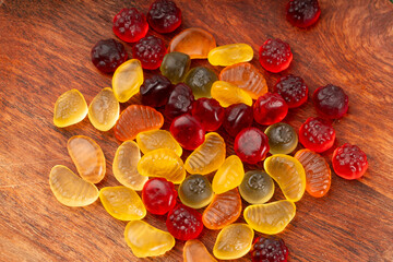 Fruit gummy candy pile, vegan chewing marmalade pills, jelly gumdrops heap