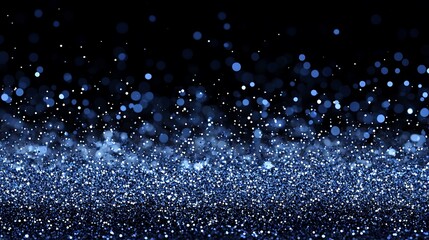 blue bokeh particles glittering in a gradient dust effect creating a futuristic abstract background ideal for award visuals festive banners,elegant design projects .