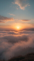 Obraz premium dramatic view of sunset glowing orange over mountain peak with fog and meadow scenic nature photography outdoor peaceful golden landscape landscape photography wallpaper background