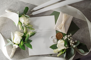 Wedding day. Bouquets and various wedding accessories, shoes, invitations, rings in the morning at the bride's preparation