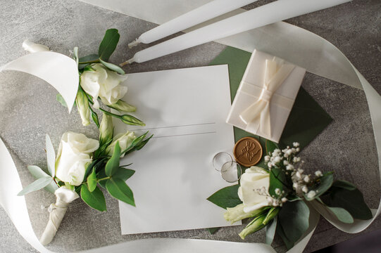Wedding day. Bouquets and various wedding accessories, shoes, invitations, rings in the morning at the bride's preparation