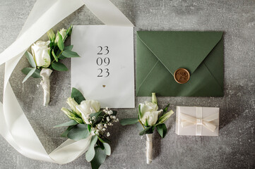 Wedding day. Bouquets and various wedding accessories, shoes, invitations, rings in the morning at the bride's preparation