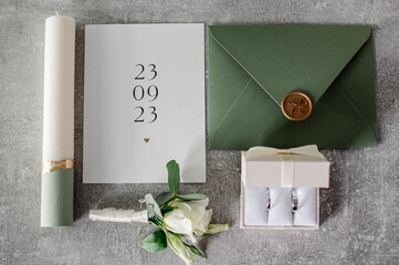 Wedding day. Bouquets and various wedding accessories, shoes, invitations, rings in the morning at the bride's preparation
