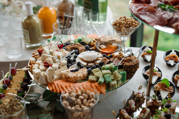 Wedding day. Buffet table with various types of snacks and sweets in the celebration hall