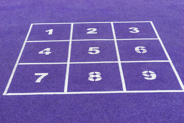 Numbered rubber floor tiles for children to play with