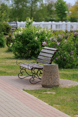benches and chaise lounges for rest on the streets of the city and in the park, public places © Kozlik_mozlik