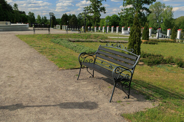 Wooden benches and chaise lounges for rest on the streets of the city and in the park, public places