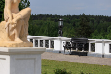 Wooden benches and chaise lounges for rest on the streets of the city and in the park, public places