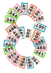 Raffle tickets in the shape of the number eight.